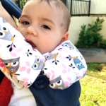 Adorable baby in the Ergo Omni 360 with DIY Bib and Drool pads made from the patterns featured on this page