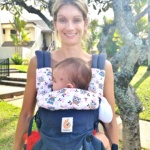 Mother wearing baby in Ergo Omni 360 with a DIY Owl fabric bib.