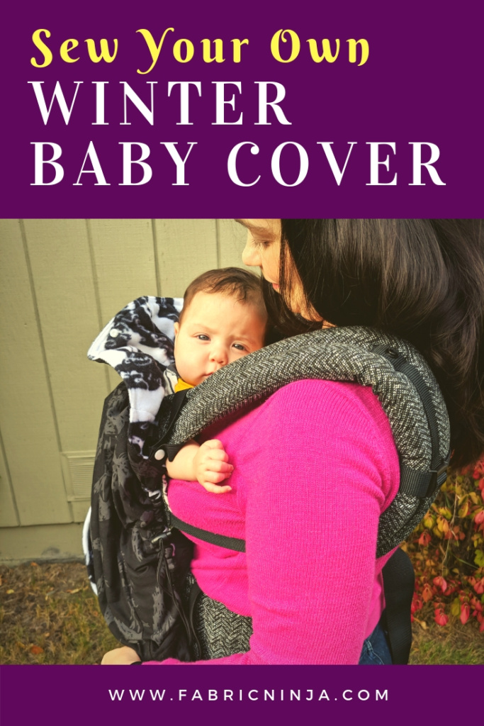 Sew your own winter baby over. Mom with pink shirt wearing baby on chest in a carrier. Baby has a grey and white carrier blanket wrapped around it. 