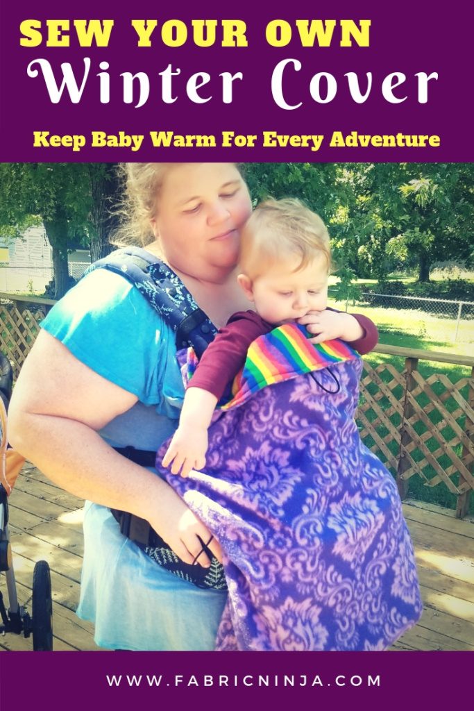 Sew your own winter cover. Keep baby warm for every adventure. Mom, wearing blue, has red-haired baby in front facing baby carrier which is covered with a purple fleece carrier blanket. 