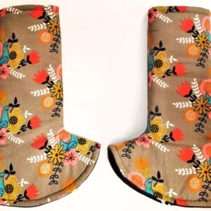 tan suck pads with flowers and birds on them