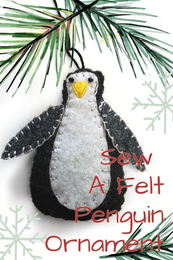 Sew a felt Penguin Ornament - Black and white felt penguin with pine branches around it
