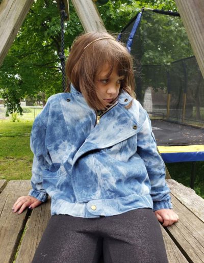 reproduction Jean jacket Cherrie from punky Brewster - modeled by young white girl