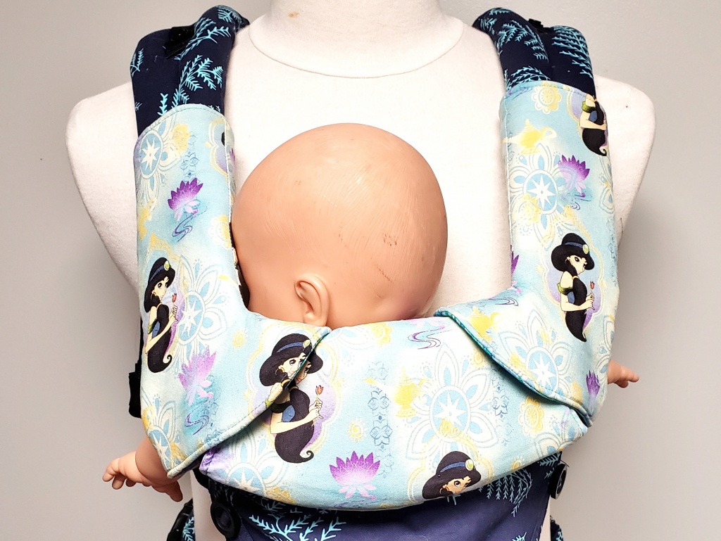 Blue Jasmine suck pads and bib on the Tula Explore Carrier