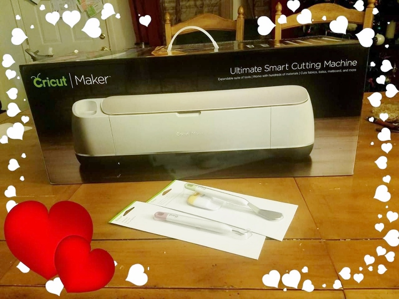 Cricut maker box with hearts around it