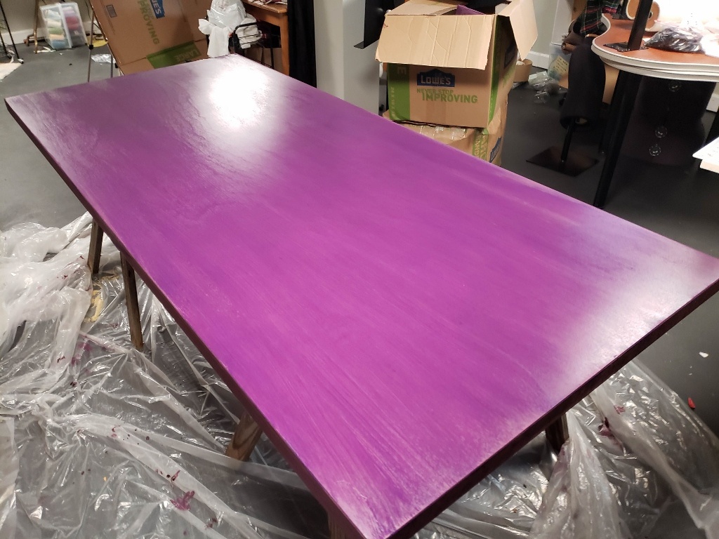 bright purple solid core door used as table. Finished with Unicorn spit stain