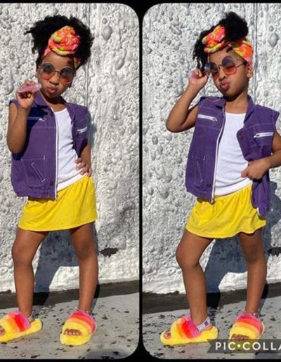 Punky brewester purple vest restyled to make it modern - modeled by young black girl