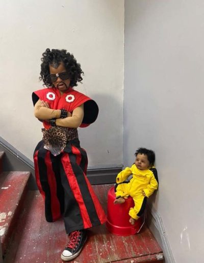 Reproduction Last Dragon Sho Nuff modeled by young black girl cosplaying