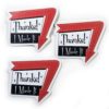 three stickers say, "Thanks! I Made It" in a 1960 sign style with arrow around one edge pointing down. Arrow is red and the sign is black and white with black writing