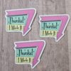 three stickers say, "Thanks! I Made It" in a 1960 sign style with arrow around one edge pointing down. Arrow is pink and the sign is Aqua and a yellow green with black writing